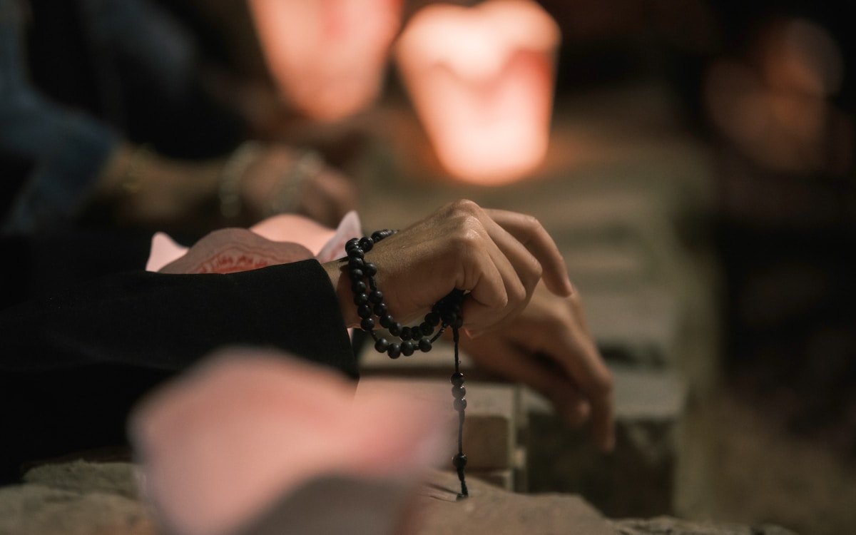 Folded hands at rest